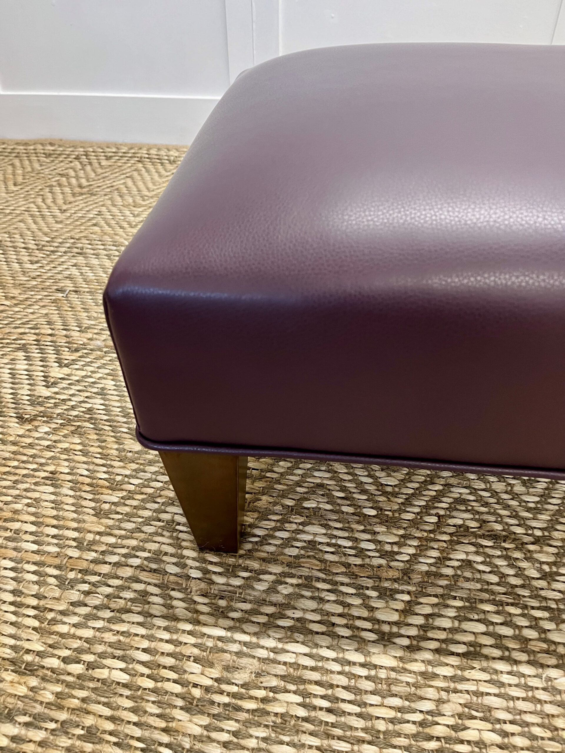 Delcor-bespoke-luxury-footstool-meticulously handcrafted in Britain-choose from over 10,000 fabrics-including velvets-leathers-vast array of patterned and plain materials-available in a broad spectrum of colours-including grey-cream-blue-purple-red-green-and more-each piece showcases timeless design and comfort.