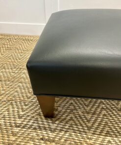 Delcor-bespoke-luxury-footstool-meticulously handcrafted in Britain-choose from over 10,000 fabrics-including velvets-leathers-vast array of patterned and plain materials-available in a broad spectrum of colours-including grey-cream-blue-purple-red-green-and more-each piece showcases timeless design and comfort.