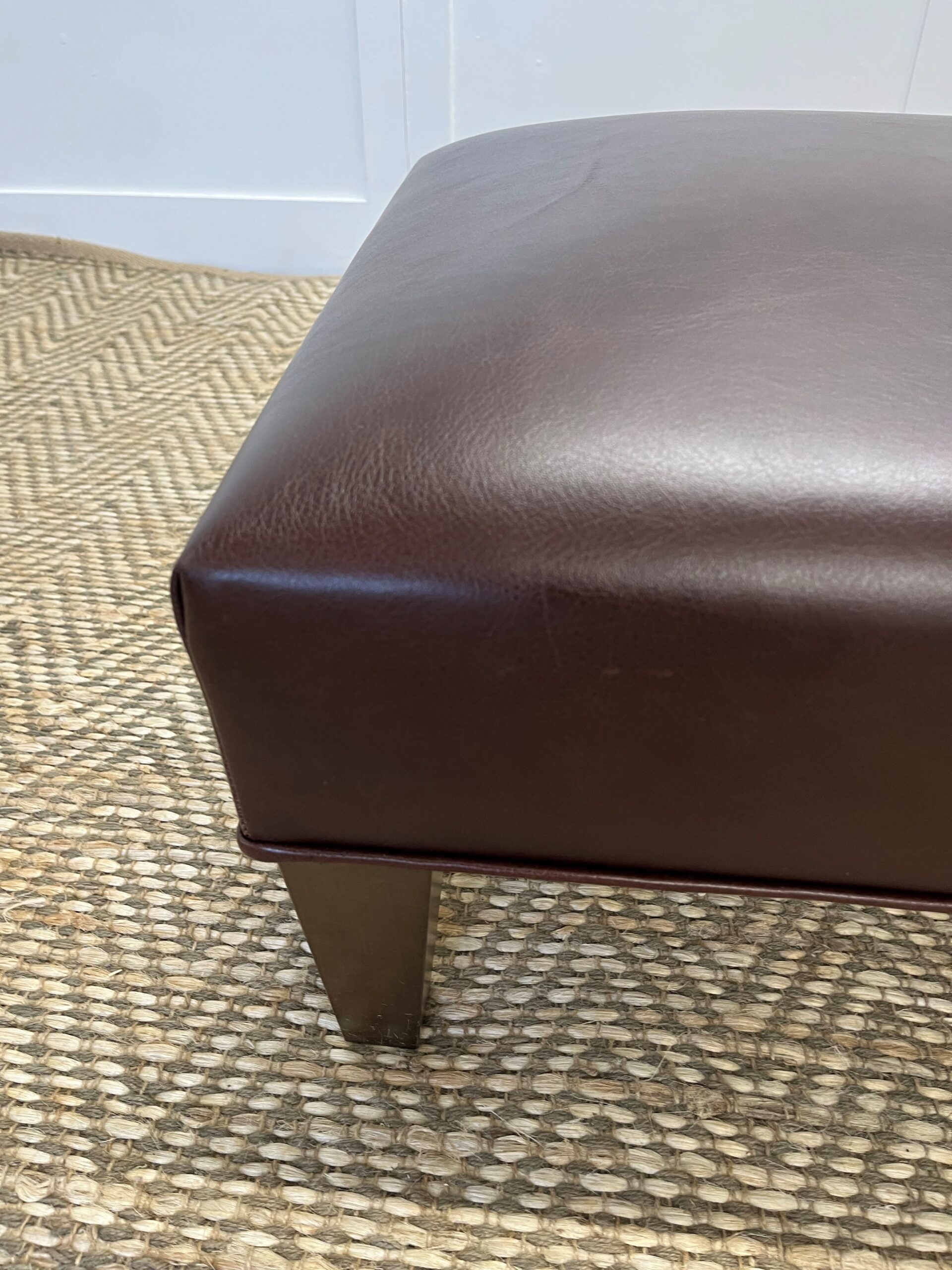 Delcor-bespoke-luxury-footstool-meticulously handcrafted in Britain-choose from over 10,000 fabrics-including velvets-leathers-vast array of patterned and plain materials-available in a broad spectrum of colours-including grey-cream-blue-purple-red-green-and more-each piece showcases timeless design and comfort.