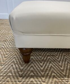 Delcor-bespoke-luxury-footstool-meticulously handcrafted in Britain-choose from over 10,000 fabrics-including velvets-leathers-vast array of patterned and plain materials-available in a broad spectrum of colours-including grey-cream-blue-purple-red-green-and more-each piece showcases timeless design and comfort.