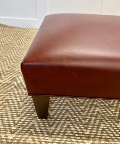 Delcor-bespoke-luxury-footstool-meticulously handcrafted in Britain-choose from over 10,000 fabrics-including velvets-leathers-vast array of patterned and plain materials-available in a broad spectrum of colours-including grey-cream-blue-purple-red-green-and more-each piece showcases timeless design and comfort.