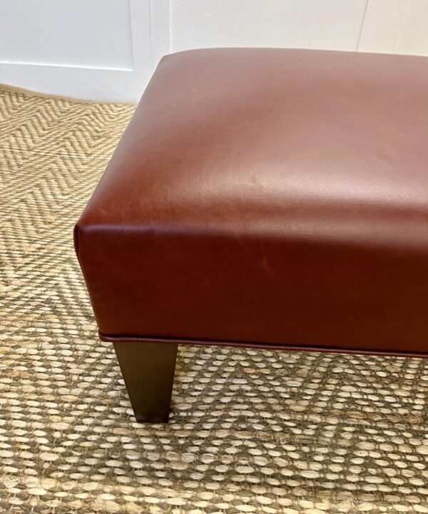 Delcor-bespoke-luxury-footstool-meticulously handcrafted in Britain-choose from over 10,000 fabrics-including velvets-leathers-vast array of patterned and plain materials-available in a broad spectrum of colours-including grey-cream-blue-purple-red-green-and more-each piece showcases timeless design and comfort.