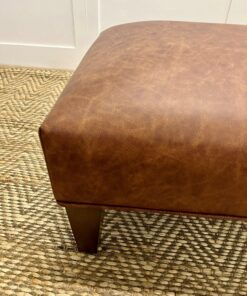 Delcor-bespoke-luxury-footstool-meticulously handcrafted in Britain-choose from over 10,000 fabrics-including velvets-leathers-vast array of patterned and plain materials-available in a broad spectrum of colours-including grey-cream-blue-purple-red-green-and more-each piece showcases timeless design and comfort.
