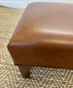 Delcor-bespoke-luxury-footstool-meticulously handcrafted in Britain-choose from over 10,000 fabrics-including velvets-leathers-vast array of patterned and plain materials-available in a broad spectrum of colours-including grey-cream-blue-purple-red-green-and more-each piece showcases timeless design and comfort.