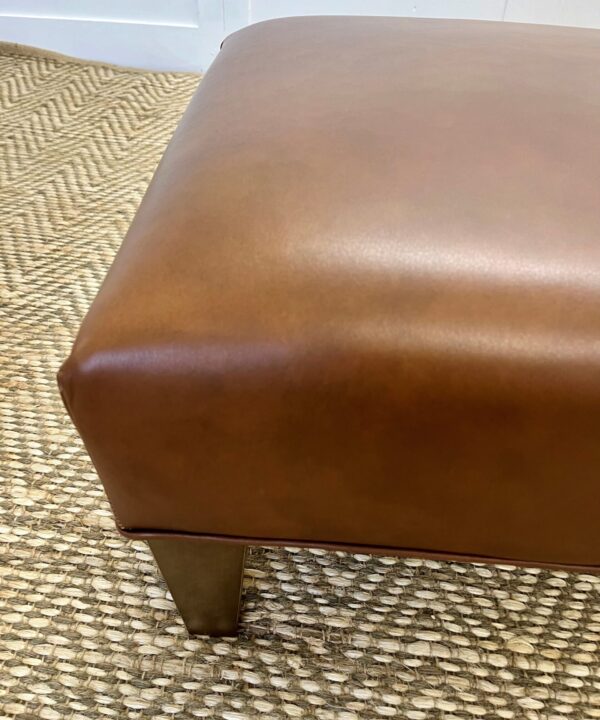 Delcor-bespoke-luxury-footstool-meticulously handcrafted in Britain-choose from over 10,000 fabrics-including velvets-leathers-vast array of patterned and plain materials-available in a broad spectrum of colours-including grey-cream-blue-purple-red-green-and more-each piece showcases timeless design and comfort.