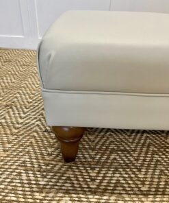 Delcor-bespoke-luxury-footstool-meticulously handcrafted in Britain-choose from over 10,000 fabrics-including velvets-leathers-vast array of patterned and plain materials-available in a broad spectrum of colours-including grey-cream-blue-purple-red-green-and more-each piece showcases timeless design and comfort.
